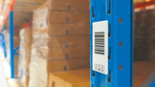 The Linde Material Handling warehouse navigation system uses barcodes on the racks.