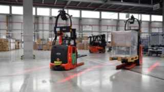 Automated forklifts from Linde Material Handling in use in the warehouse